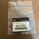 Genuine Mitsubishi Oil Seal Crankshaft Front MD377999. Fixed Price $16.00.