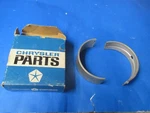 Crankshaft Main BEARING,N.O.S.STD.W/440 ENG.70-75 Mopars 3420009. Fixed Price $18.00.