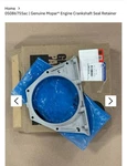 New Oem Mopar Engine Crankshaft Seal Retainer Part #05086755AC. Fixed Price $120.00.